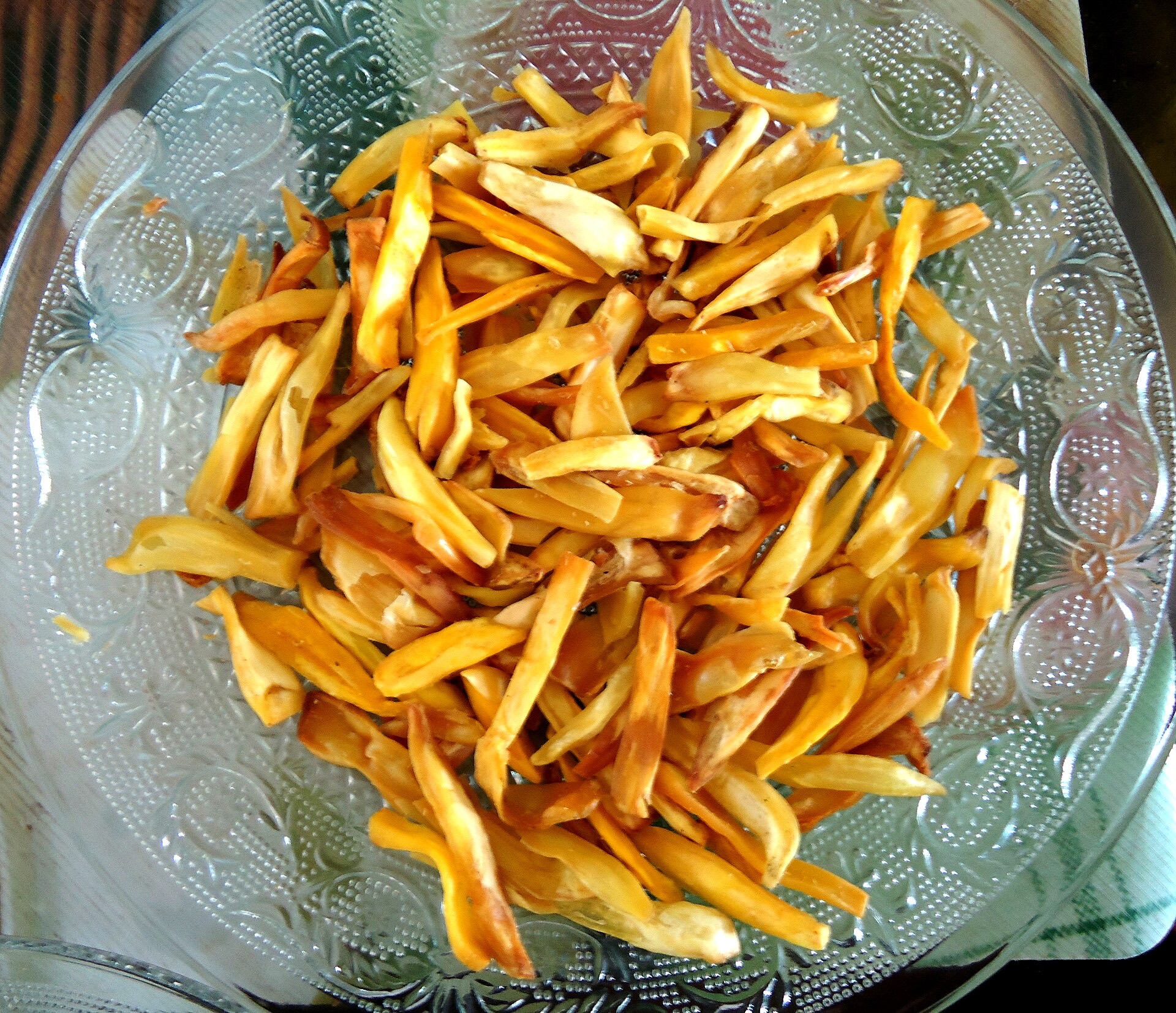 Kerala chips stored in bulk, staying crisp in dry containers.