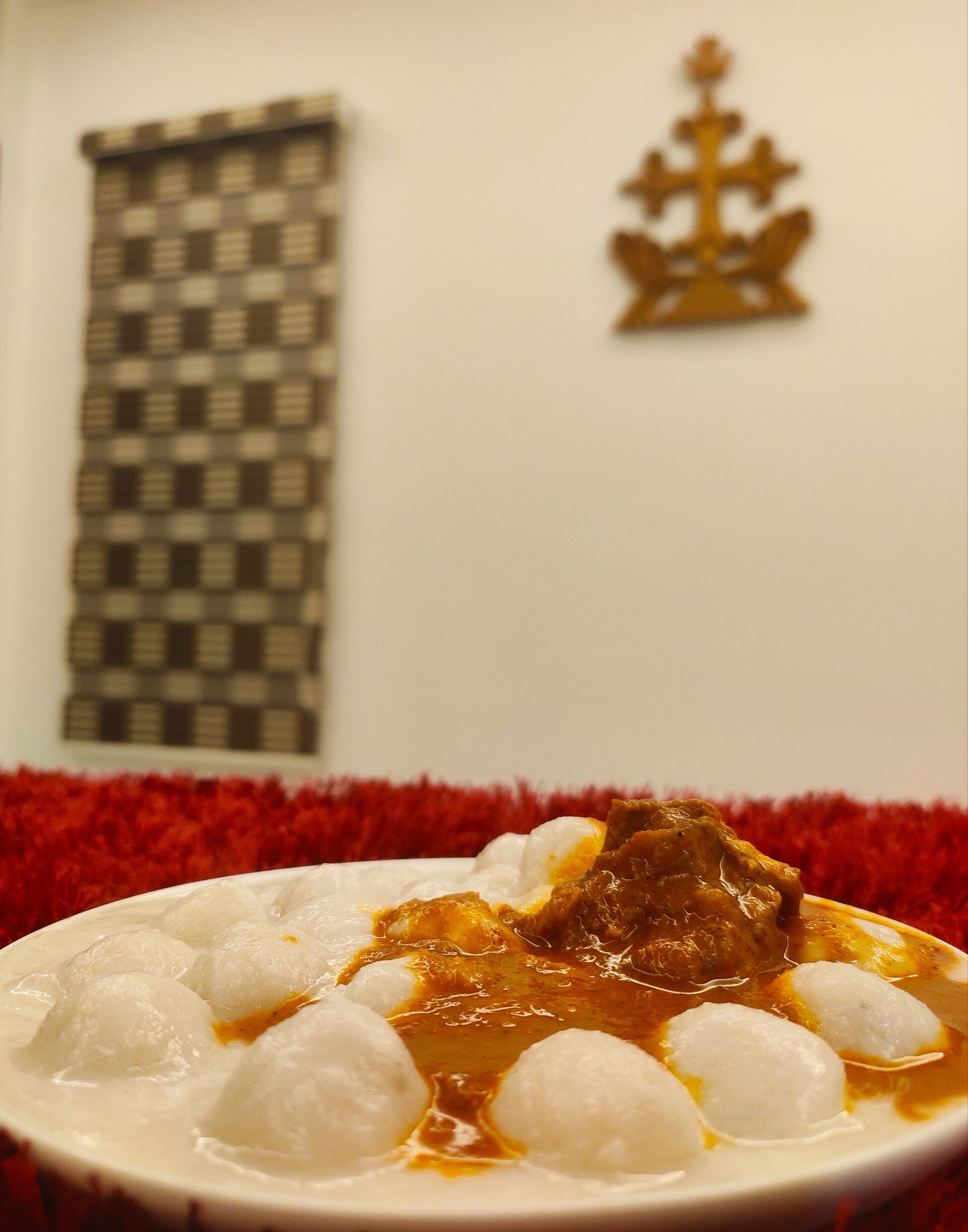 Kozhi Pidi - marble-sized rice dumplings in a rich coconut-milk chicken curry.