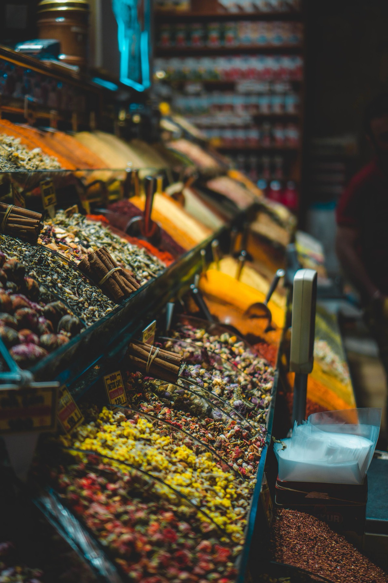 A Kerala market stall stacked with spices and dry goods.